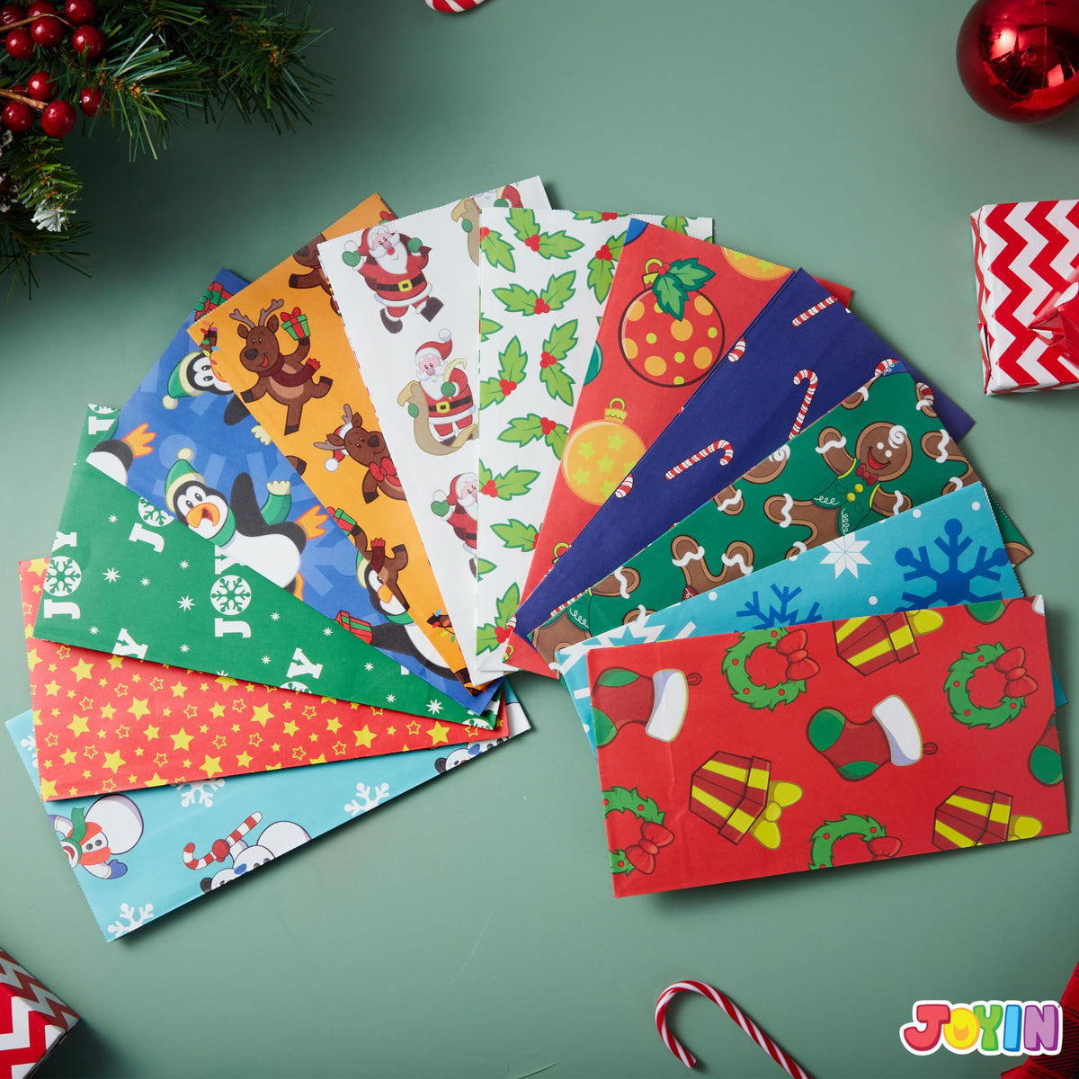 Joiedomi 72 PCS of Christmas Goody Kraft Bags, 12 Assorted Xmas Designs Small Holiday Goodie Gift Bags for Classrooms Party Favors, Christmas Craft Party Treat (9.75" x 3" x 5")