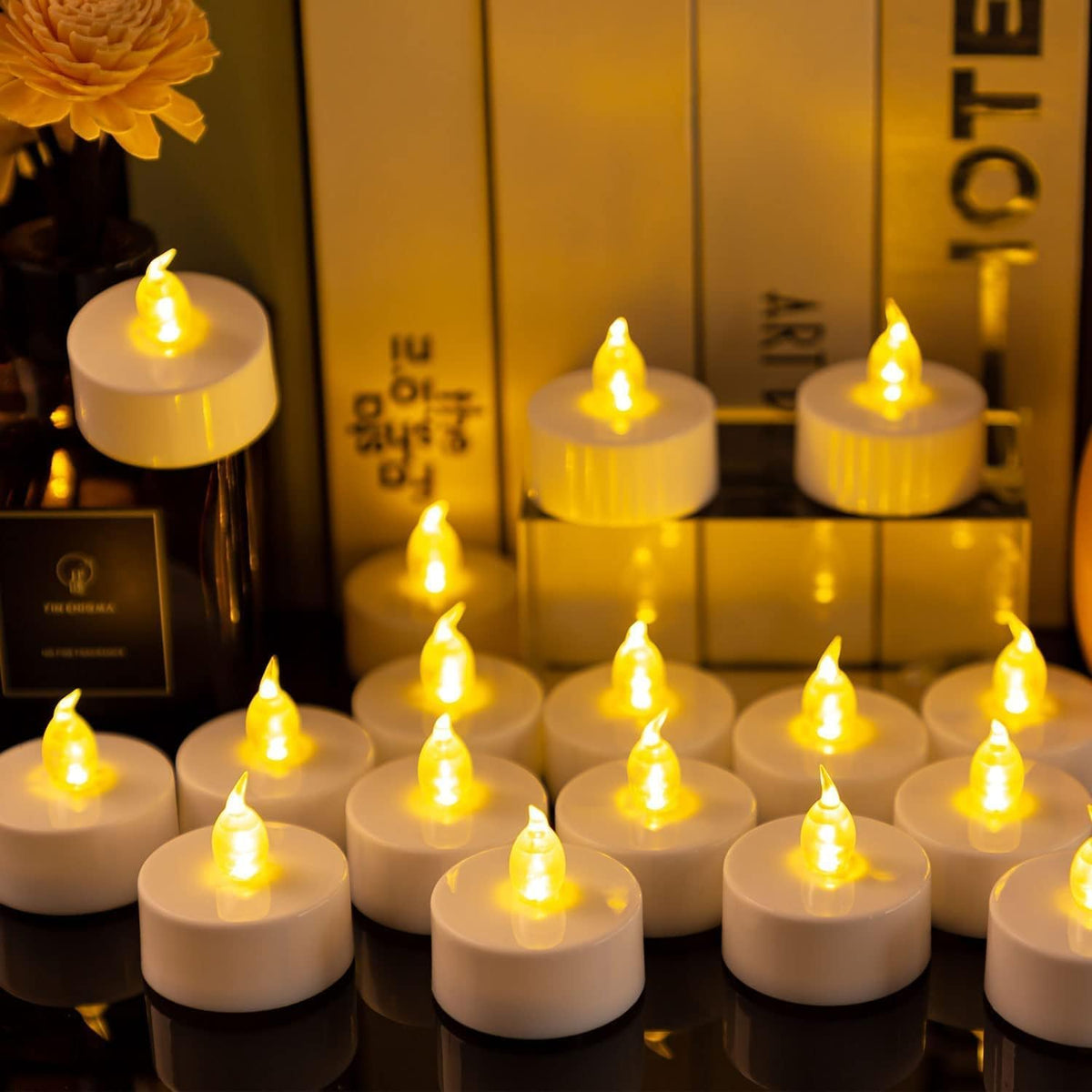 PUNPUBA LED Tea Lights Candles- 100Pack Flameless Candles Realistic and Bright Flickering Long Lasting 200Hours for Holiday Celebration,Party, Home Decoration WarmYellow,Battery Operated
