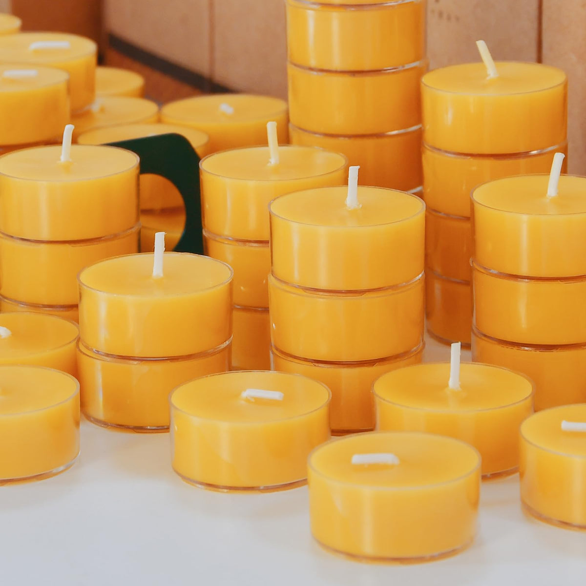 DEYBBY Natural Beeswax Tealight Candles 200 Pack, Unscented Small Beeswax Candles Bulk in Clear Cup, 4-5 Hours Burn Tea Light Candles for Home Decor Emergency Bath Relaxation (Yellow)