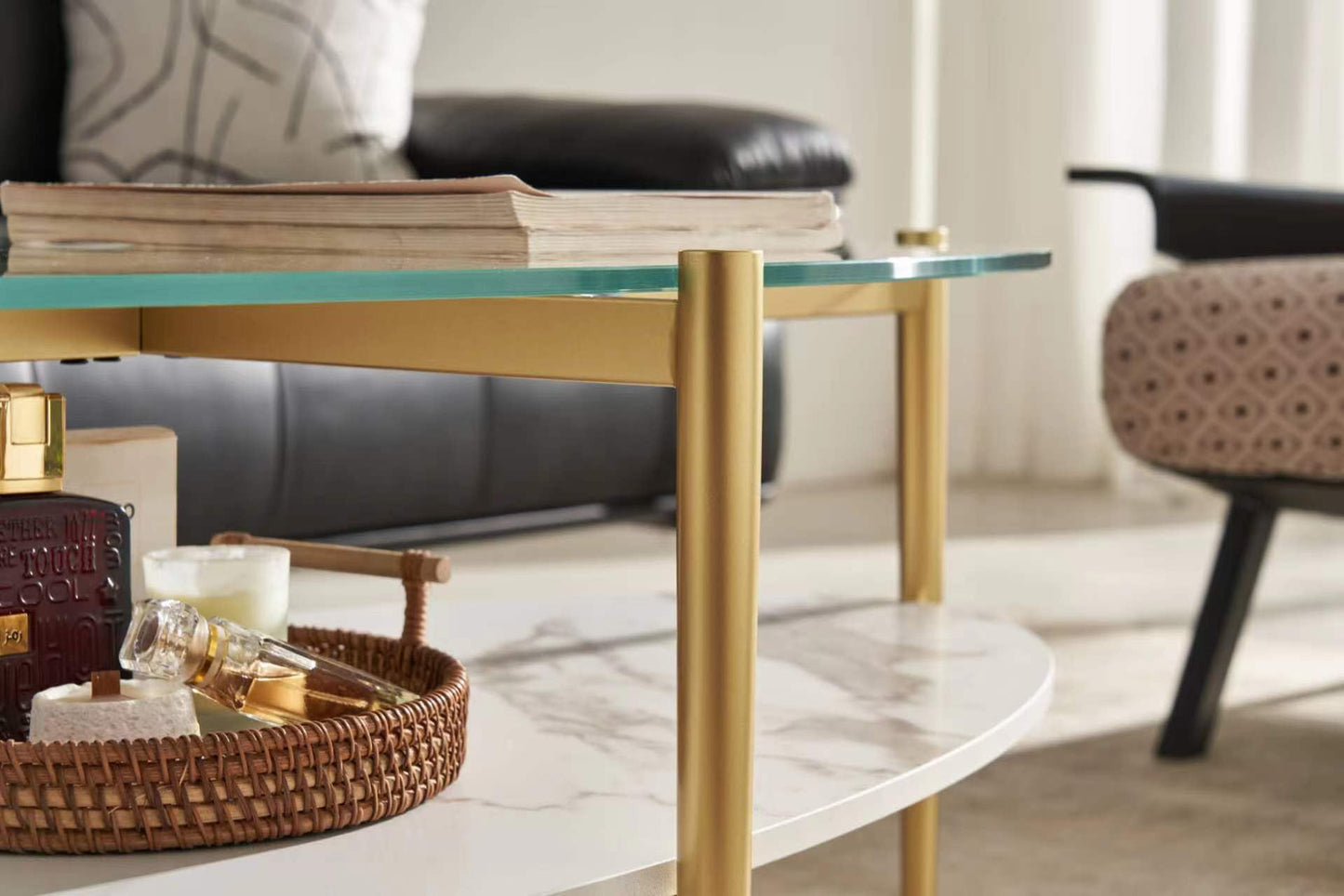 Shrine Oval Coffee Table, Mid-Century Modern Design, 2-Tier Structure, Clear Glass Top and White MDF Shelf, 47" D x 21" W x 17" H, Sleek Conical Metal Legs with Gold Finish