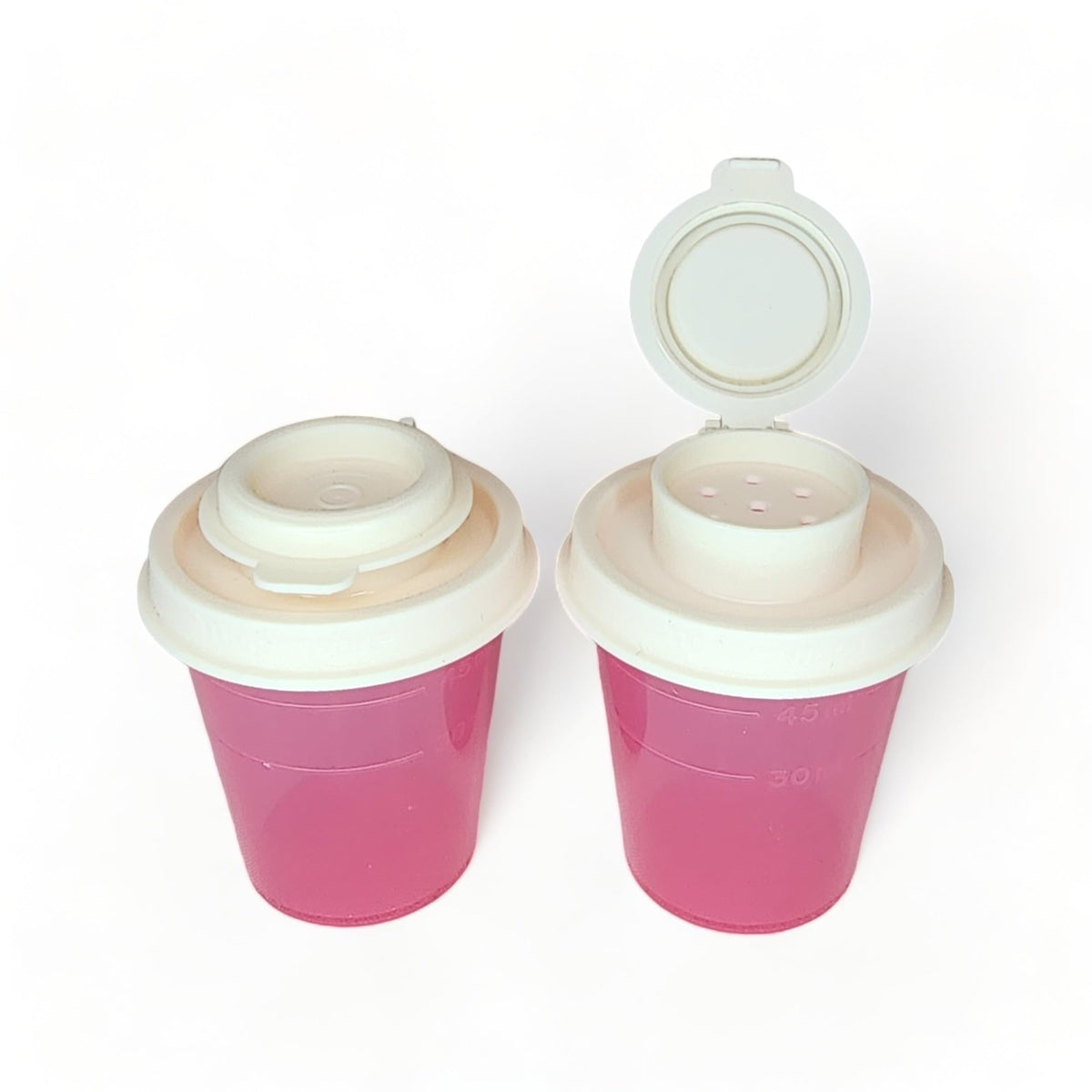 Tupperware Mini Salt and Pepper Shakers 2 oz Pink with Cream Lids
