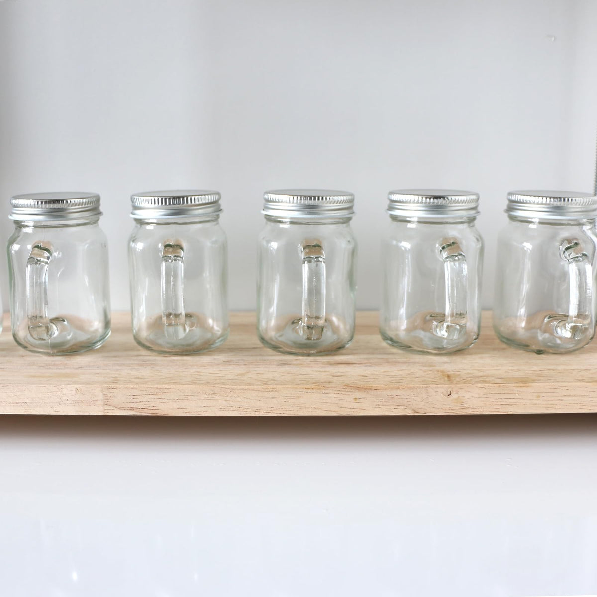 Homelike Style 4 oz Mini Mason Jar Mugs with Handle, Small Glass Jars with Airtight Metal Lids, 12 Pack Empty Glass Mugs for Gift Party Wedding Candle and Favor