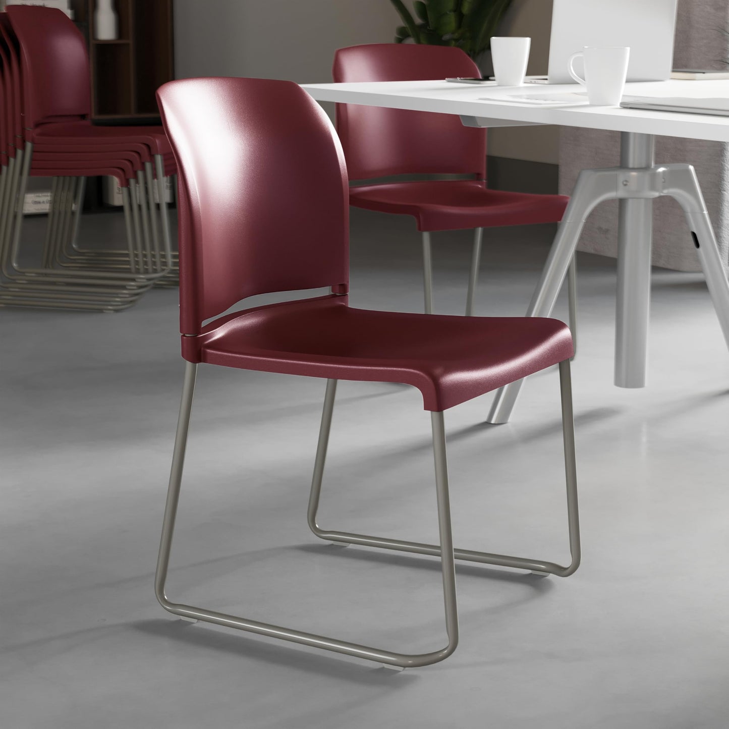 Flash Furniture HERCULES Series 880 lb. Capacity Burgundy Full Back Contoured Stack Chair with Gray Powder Coated Sled Base