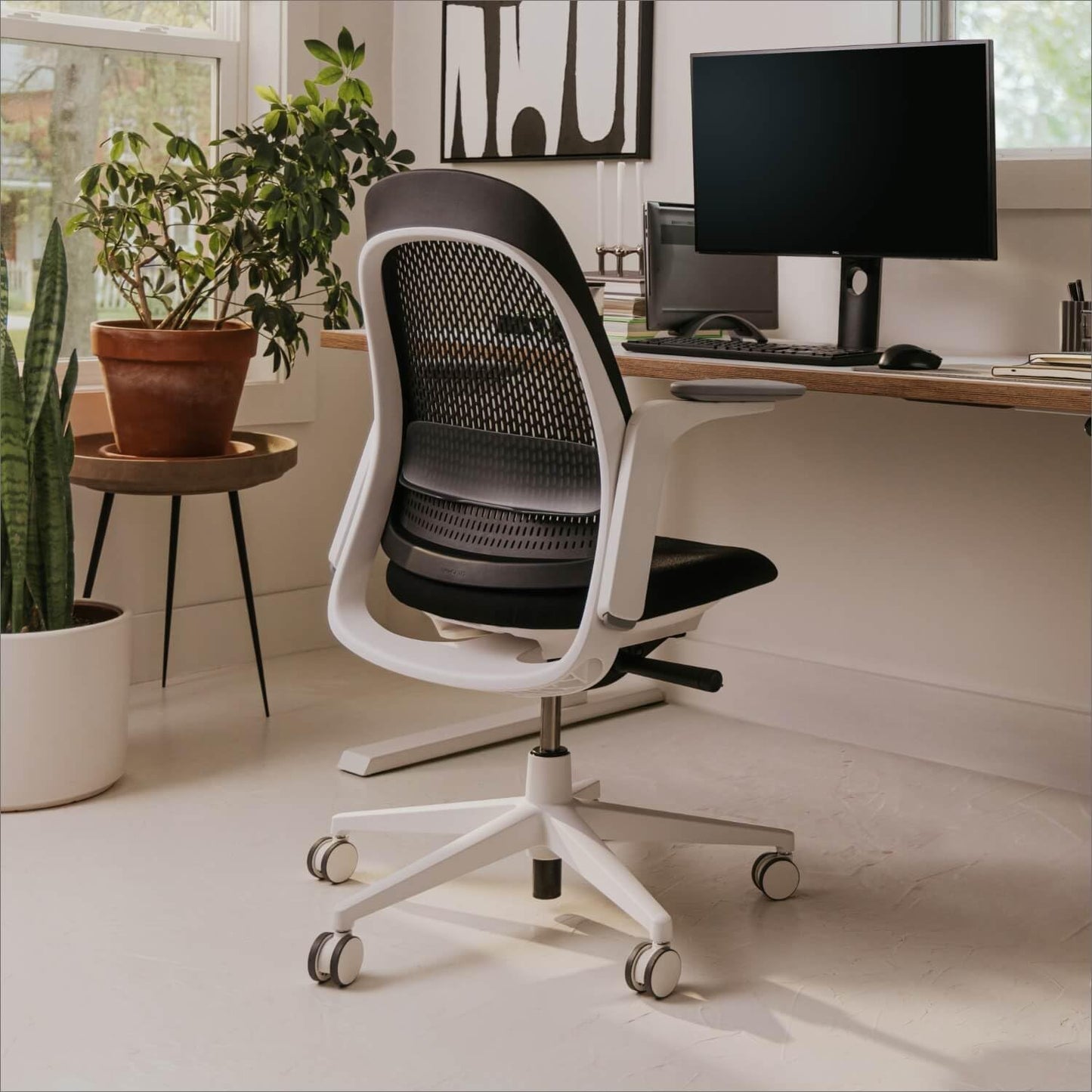 Haworth Breck Office Chair - Ergonomic Desk Seat with Height-Adjustable Lumbar Support, White Trim, Duo-Tone Hard Casters,and 4D-Arms (Coal)