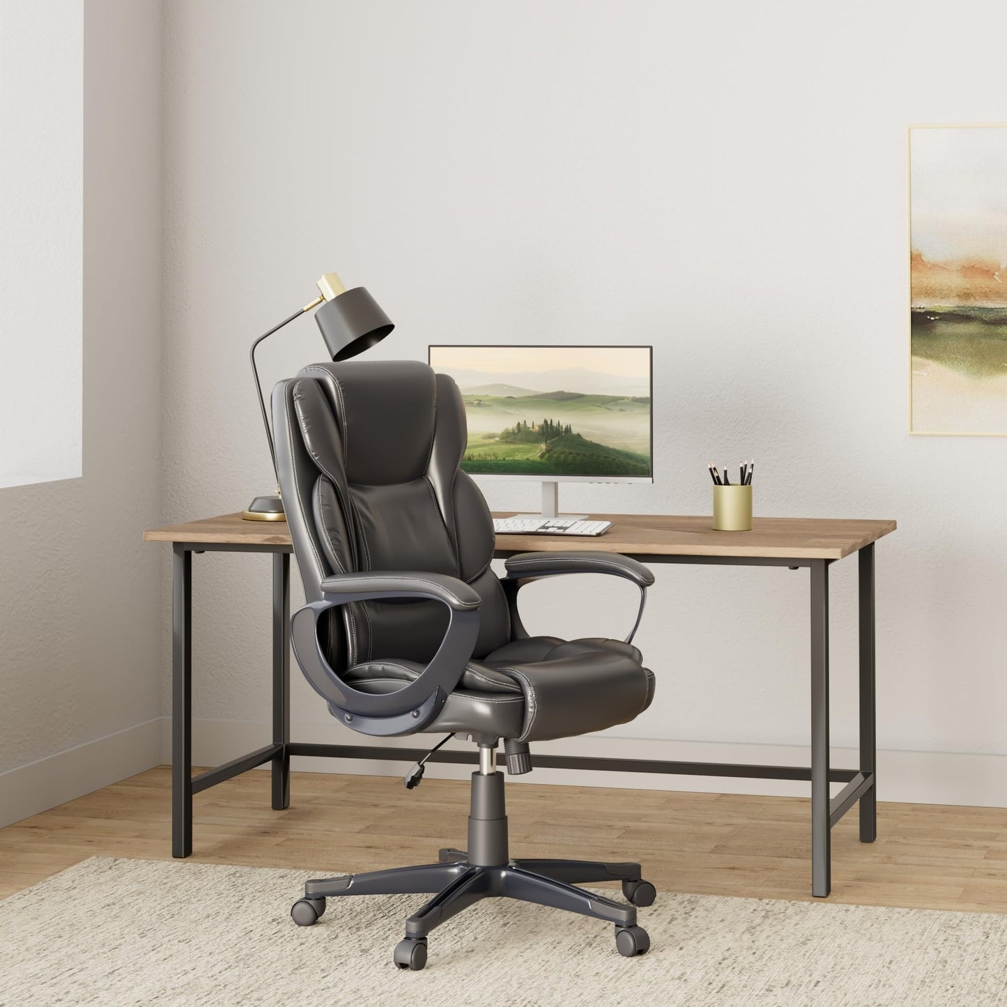 Staples Mcallum Ergonomic Manager & Executive Office Chair, Task Desk Swivel Chair with Wheels, Adjustable Height, Bonded Leather, Black