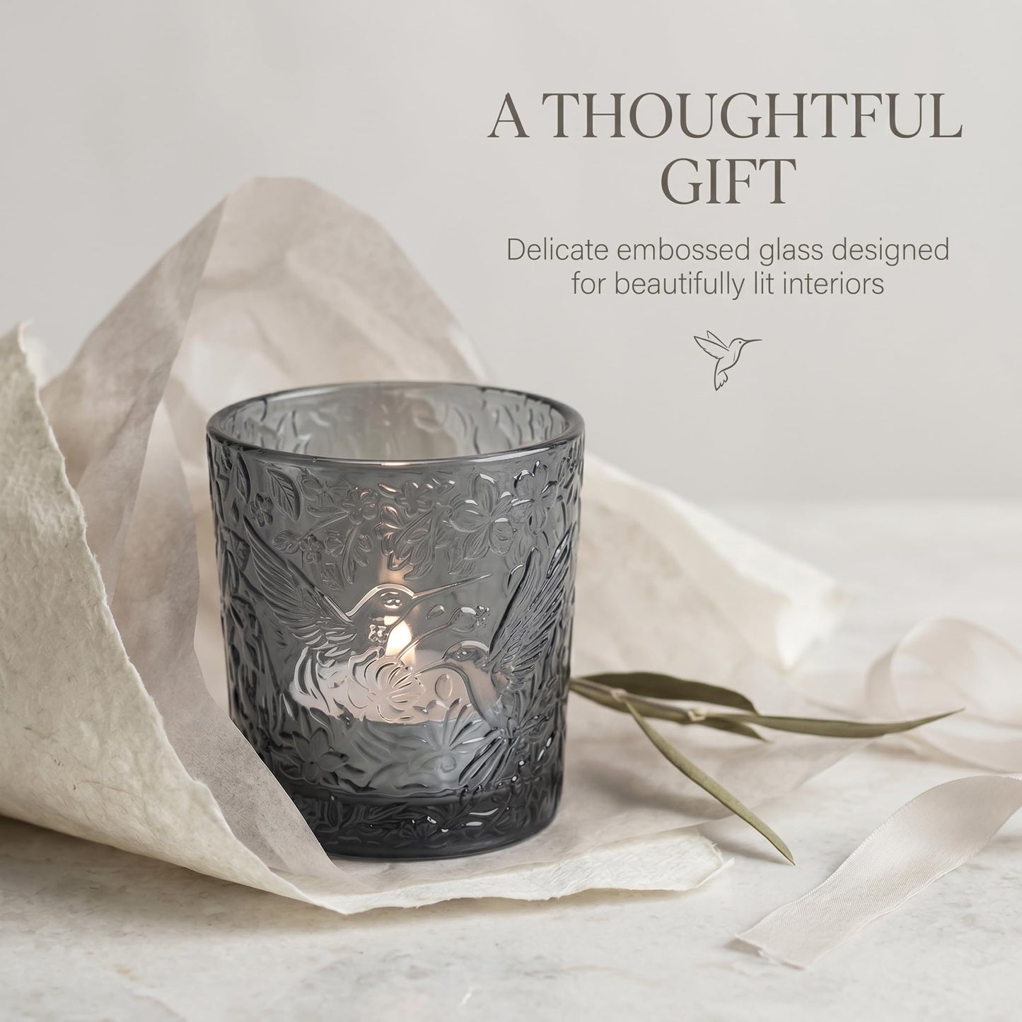 12 Pack Hummingbird Embossed Glass Candle Holders – Votive Tealight Holders with Patent Design, Decorative Embossed Glass Cups for Wedding Centerpieces, Parties, and Home Décor (Smoky Quartz)