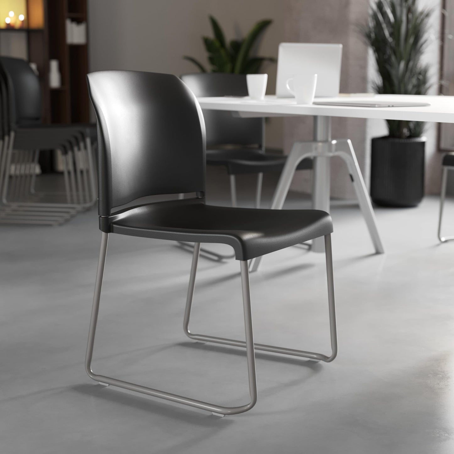 Flash Furniture HERCULES Series 880 lb. Capacity Black Full Back Contoured Stack Chair with Gray Powder Coated Sled Base