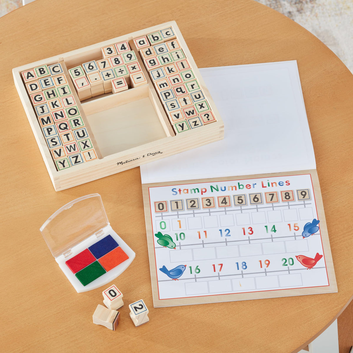 Melissa & Doug Deluxe Letters and Numbers Wooden Stamp Set ABCs 123s With Activity Book, 4-Color Stamp Pad - FSC Certified