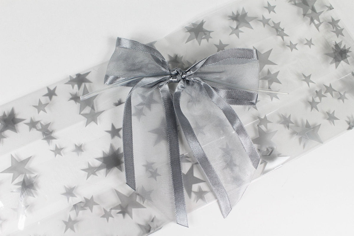 Saybrook Products Silver Stars Christmas Holiday Hanukkah Cellophane Treat Party Favor Bags with Twist-Tie Organza Bow. Set of 10 Ready-to-Use, Gussetted 11x5x3 Goodie Bags with Silver Metallic Bows.