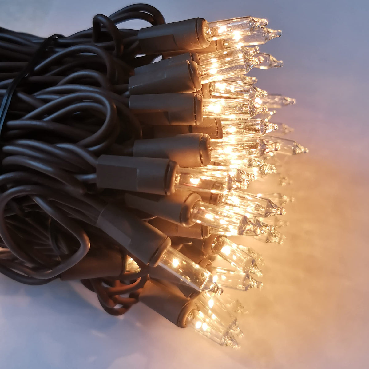 MXTCLM 100 Clear Mini Brown Wire Christmas Lights 23ft Incandescent Waterproof UL Certified Fairy String Lights for Outdoor Indoor Home Party Holiday Xmas Tree Decoration