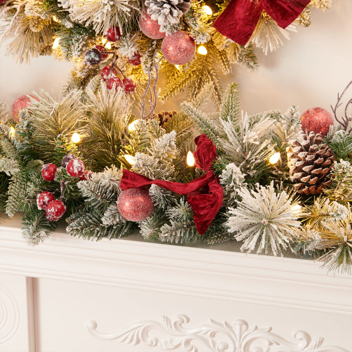 AMERZEST 9FT Pre-lit Flocked Snow Christmas Garland, Berries and Bows and 50 Lights, Plug in, Holiday Decoration Fireplace Stairs Mantle Door Indoor Outdoor